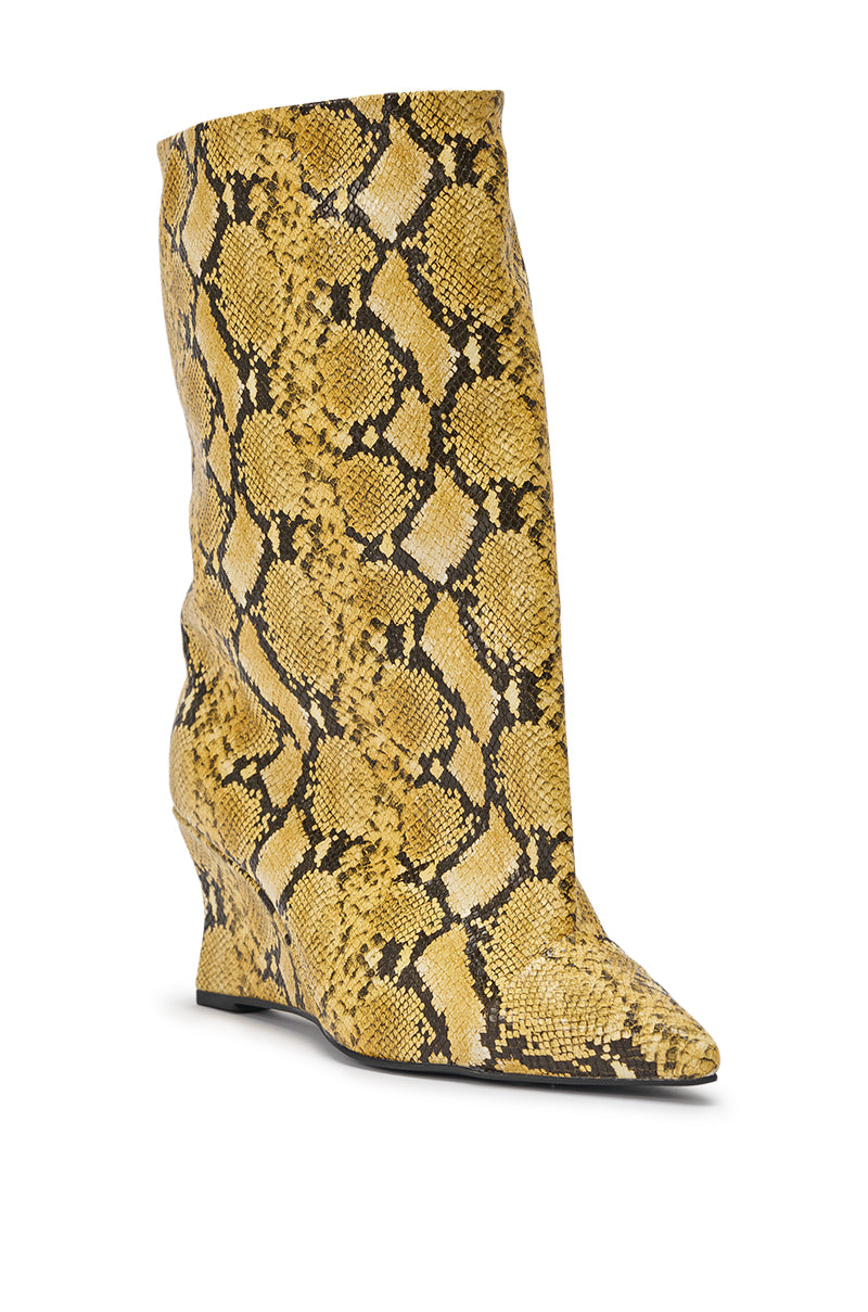 The AZALEA WANG VINCI Yellow Snake PU Print Wedge Bootie features a knee-high, pointed toe wedge design with a yellow and black faux snakeskin print, shown standing upright against a white background. 3