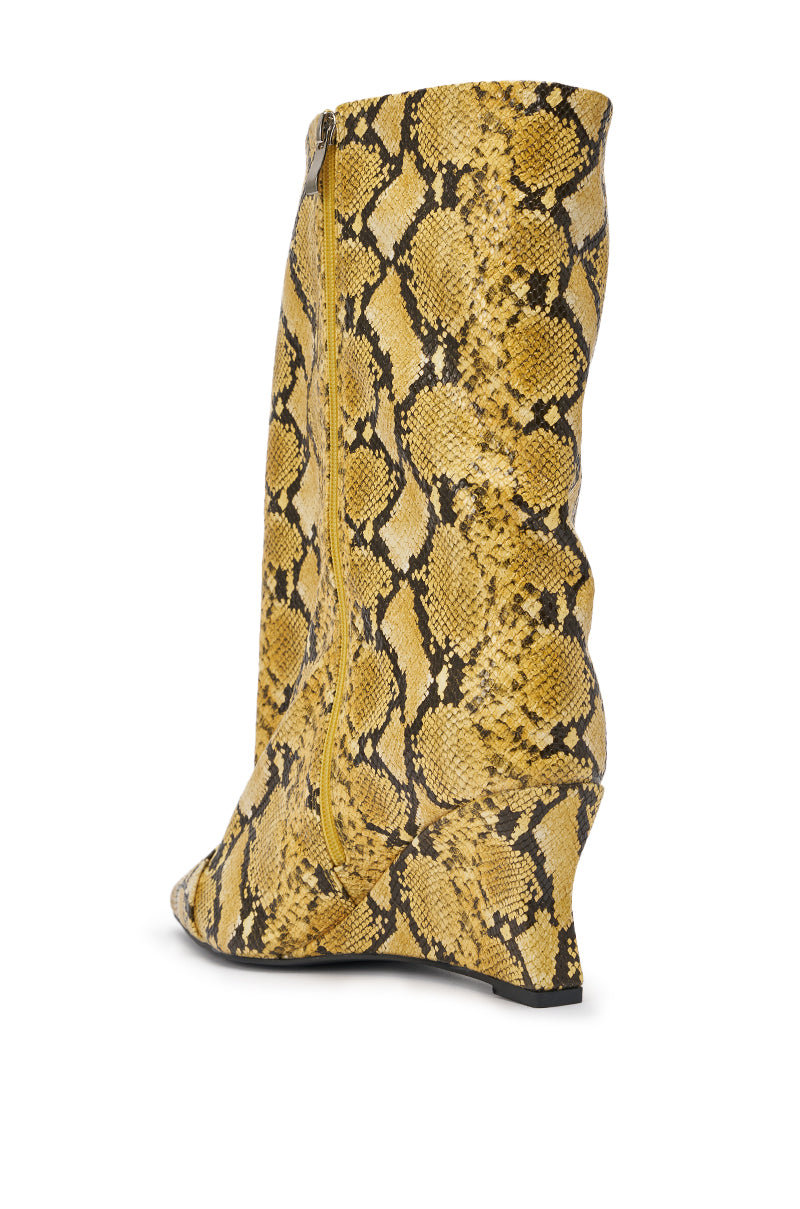The AZALEA WANG VINCI Yellow Snake PU Print Wedge Bootie, featuring a pointed toe, side zipper, yellow and black snake-print faux leather, and slight wedge heel, is shown against a white background. 4