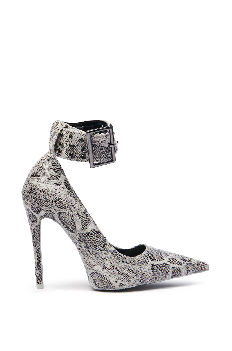 Introducing the AZALEA WANG VOLNEY SNAKE STILETTO PUMP: a high-heeled shoe featuring a pointed toe, sleek faux leather upper, gray and black embossed snakeskin pattern, high ankle strap, and large buckle for a modern statement look.