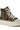 The AZALEA WANG WACKY CAMO HIGH TOP SNEAKER, in green and brown camouflage, showcases white laces and a sturdy platform sole. Displayed at an angle, it emphasizes the intricate design and details, seamlessly merging style with practicality.