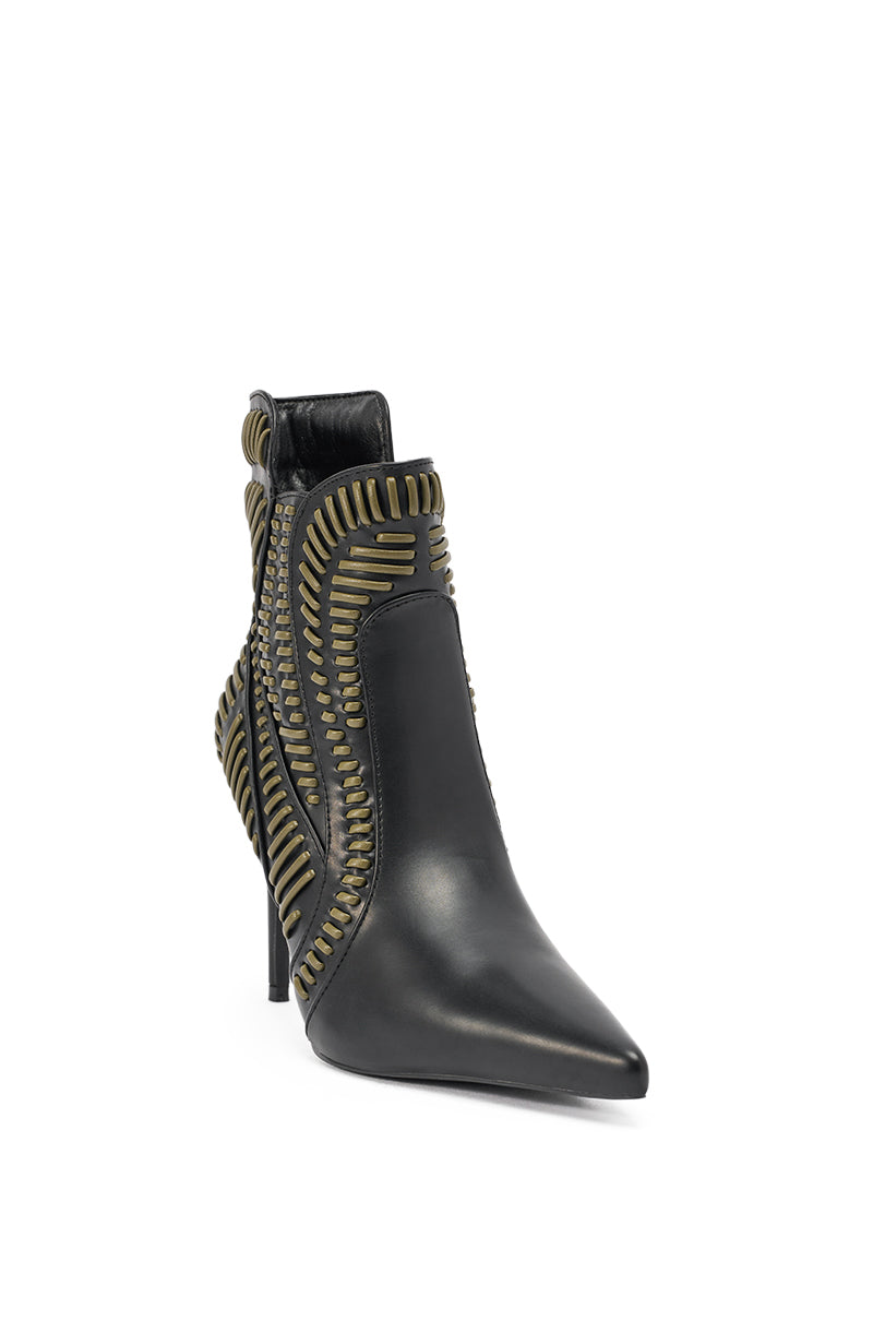 The AKIRA GOLD WEAVER BLACK AND OLIVE BOOTIE features black faux leather, a pointed toe, high heel, olive green stitching, and woven detailing along the sides, heel, and ankle. 5