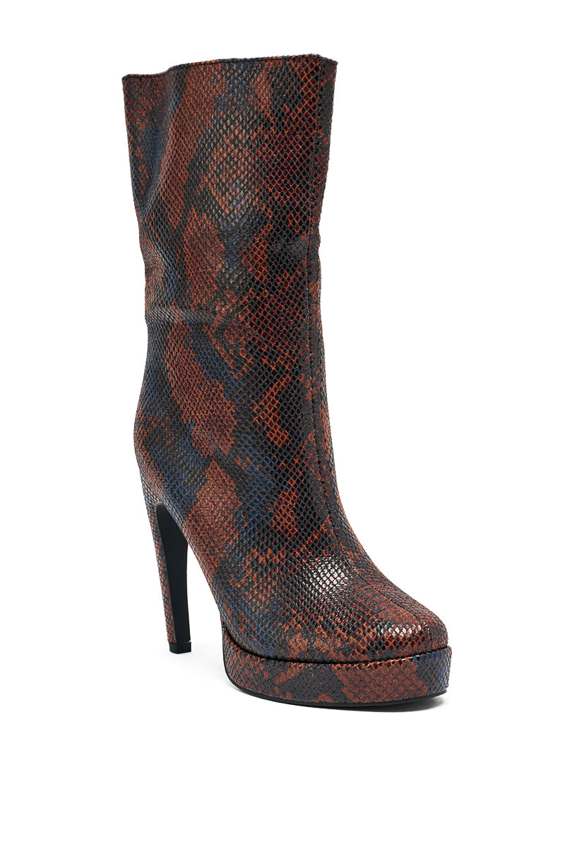 The AZALEA WANG WENONA BROWN MULTI SNAKE BOOTIE is a high-heeled, mid-calf boot with a platform sole, pointed toe, and bold brown and black faux snakeskin pattern—perfect for making a statement.