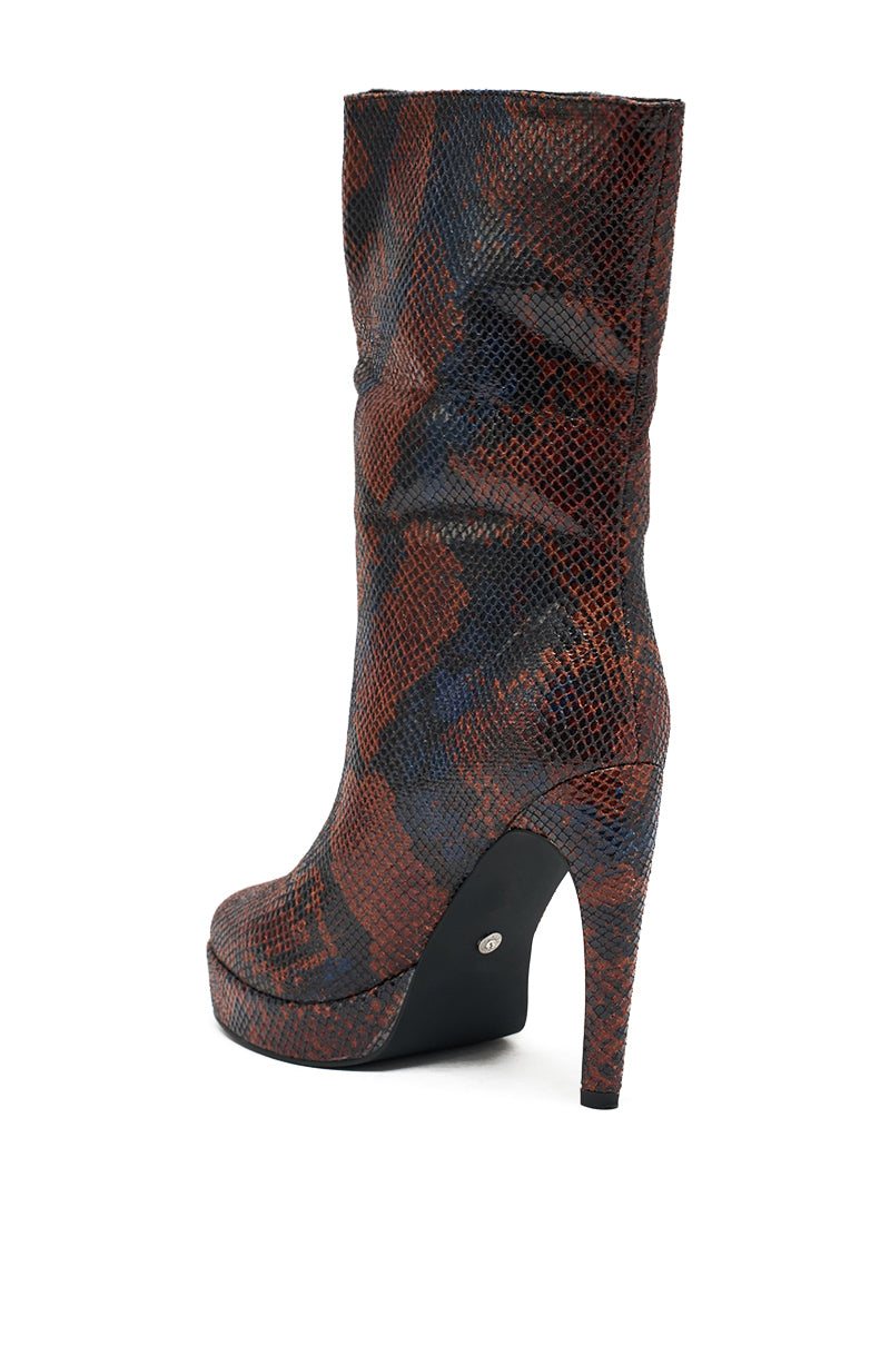 The AZALEA WANG WENONA BROWN MULTI SNAKE BOOTIE is a high-heeled, knee-high boot featuring a chunky platform sole and brown and black faux snakeskin pattern, displayed in profile against a white background.