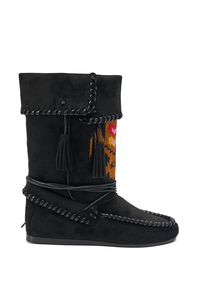 The AZALEA WANG WERET BLACK FLAT BOOTIE features faux suede, a fold-over cuff, decorative stitching, tassel accents, and a colorful embroidered side pattern.