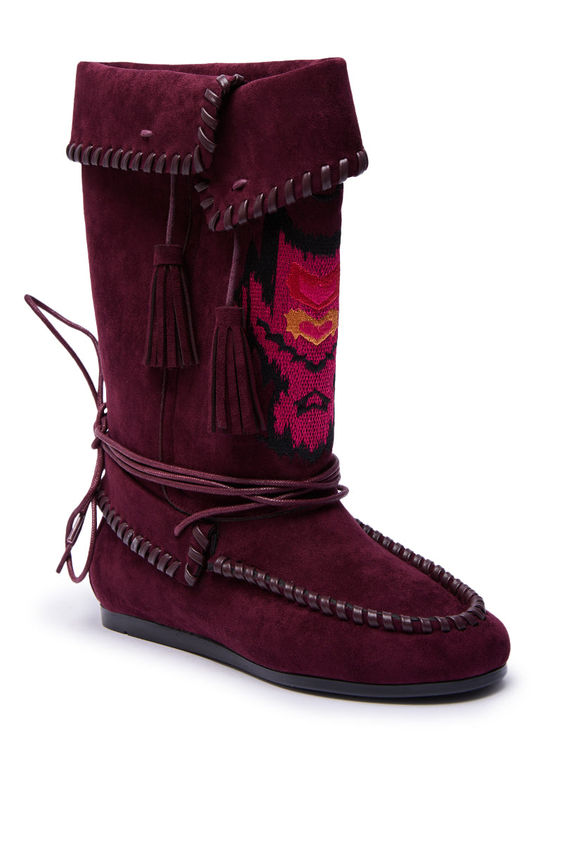 The AZALEA WANG WERET PLUM FLAT BOOTIE features decorative stitching, a fold-over top, tassels, wrap-around leather laces, and a colorful embroidered front for a bohemian touch.