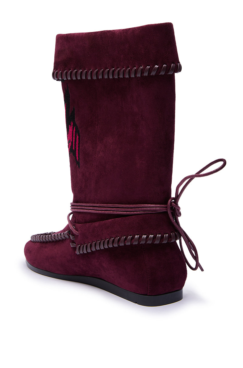 The AZALEA WANG WERET PLUM FLAT BOOTIE features a maroon faux suede design with edge stitching, a fold-over top, wraparound laces tied at the back, and a flat black sole for effortless boho style.