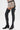 Wearing the AZALEA WANG WESTLANN BLACK PU CHAP BOOT—black, Western-inspired thigh-high faux leather boots with side zippers and pointed toes—paired with animal print shorts and a black belt, against a plain white background.