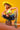 A woman poses against a yellow backdrop in a neon green bikini top, denim shorts, GREEN WITH NO ENVY TIGHTS, a large fuzzy yellow hat, leopard print bag and heels, and chunky bracelets.
