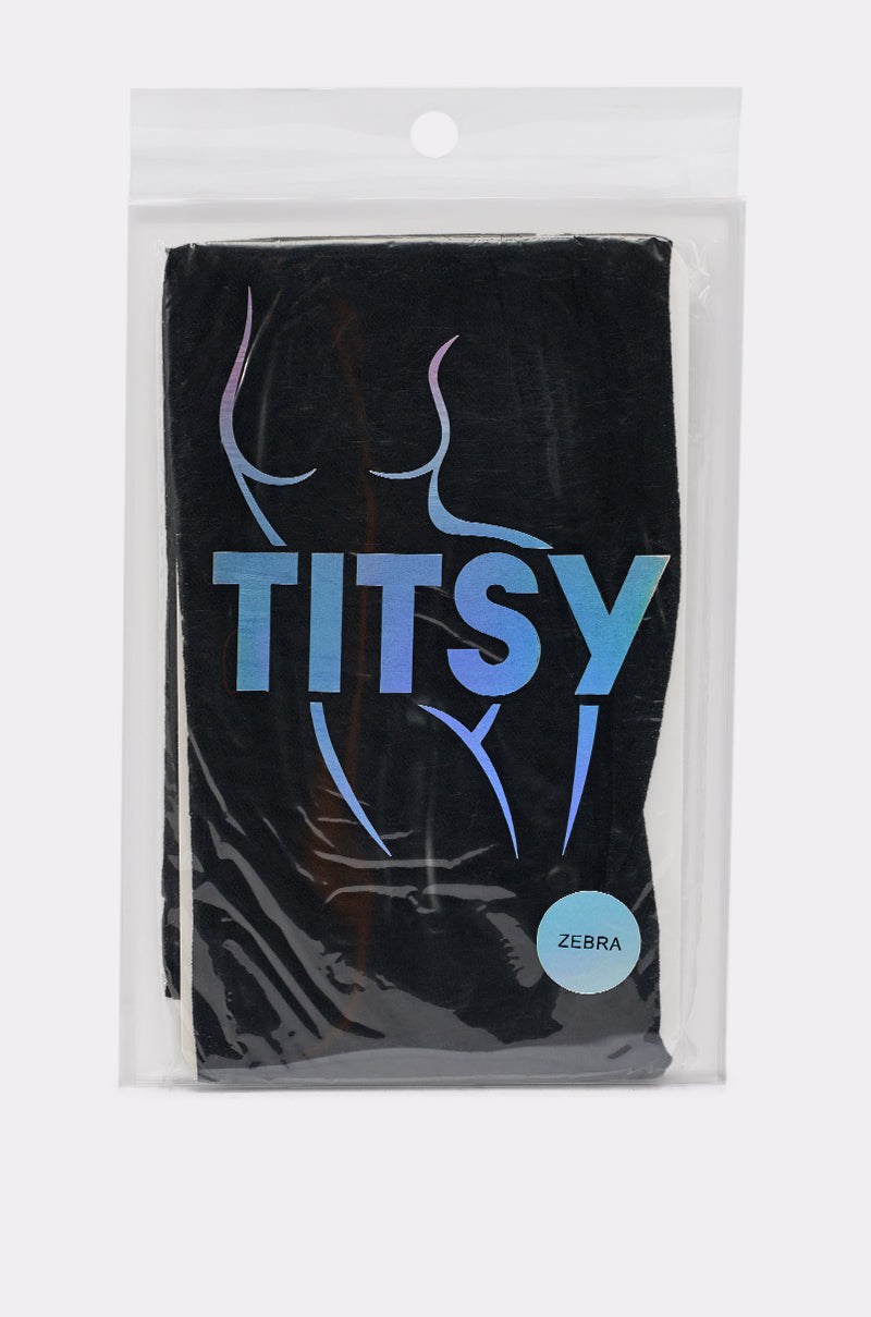 A package featuring a black garment with a holographic female torso and "TITSY" on the front; a small round label reading "ZEBRA" suggests the contents are ZEBRA STRIPE TIGHTS, likely made of sheer knit hosiery. 1