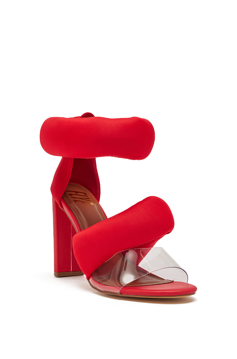 The YANIX RED PUFF SLIP ON SANDAL features bold puffy red straps at the ankle and toe, a chunky heel, open toe design, and a clear front strap. 4
