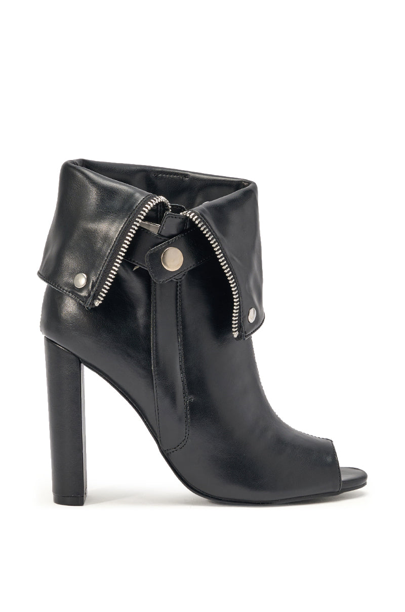 The YANIX BLACK PU SILVER HARDWARE CHUNKY HEEL BOOTIE features a folded cuff, exposed silver zipper, snap button detail, open toe, and ankle-high design. Its bold block heel stands out against a white background. 3