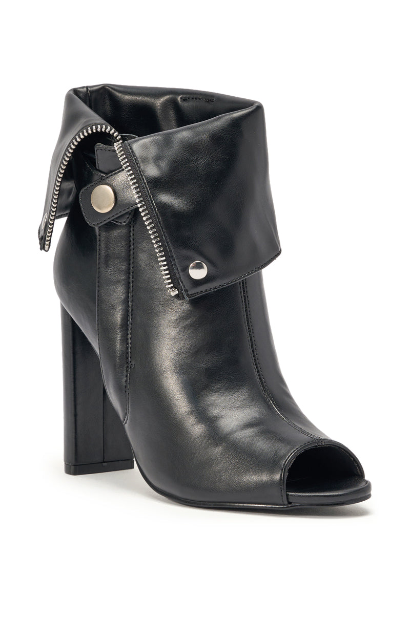 The YANIX BLACK PU SILVER HARDWARE CHUNKY HEEL BOOTIE features black faux leather, a folded cuff, decorative silver zipper, snap button detail, block heel, and an open toe design. 4