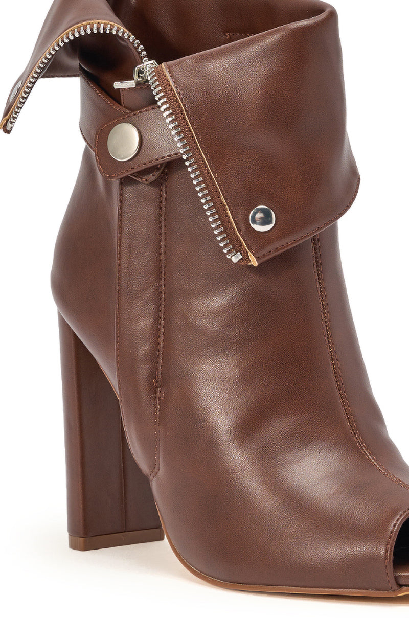 The YANIX Brown PU Silver Hardware Chunky Heel Bootie features a folded, zippered cuff with a silver snap button and a chic peep toe, combining style and comfort in an on-trend ankle design. 7