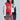 A person wears the CHAMPIONS LEAGUE FAUX LEATHER BOMBER, a red and white varsity jacket with sports-themed patches, along with a skirt made from colorful ties. Black glasses add to the look, which boasts star elements and bold text details.