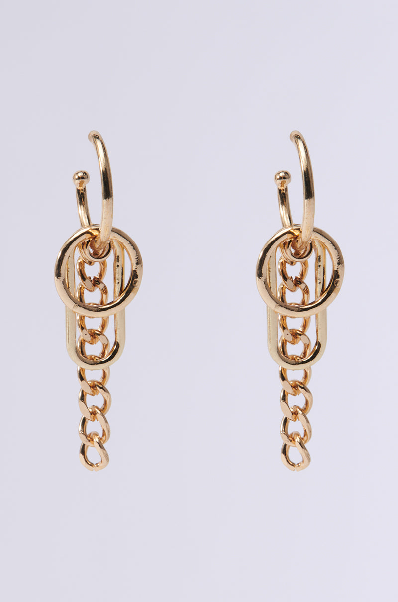 The ITS GIVING HOOP EARRING boasts a stylish chain-link design with interlocking loops and cascading curb chain segments, set against a plain white background.