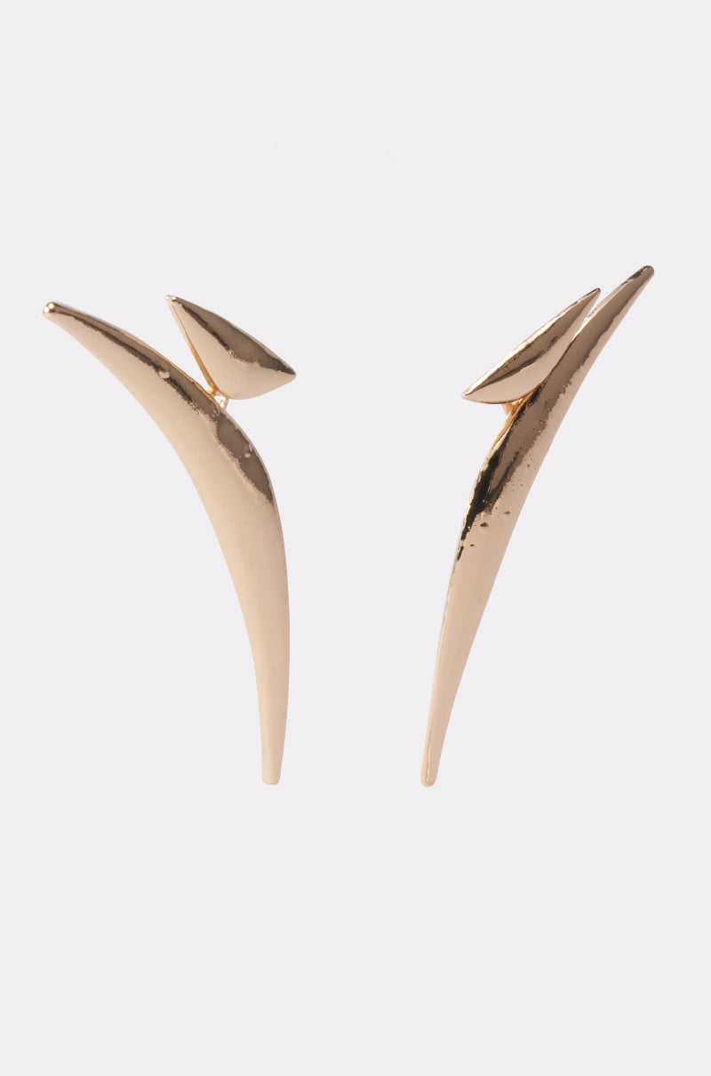 The DONT PLAY EARRING features a modern gold-tone sculptural design with sleek, curved shapes that resemble abstract leaves or petals—ideal for minimalist outfits. Photographed on a plain white background. 3