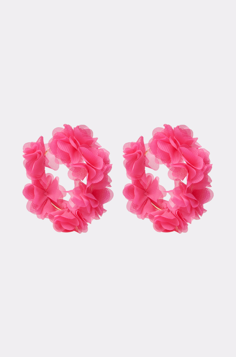 A pair of FULL BLOOM HOOP EARRINGS with layered flower petals and delicate floral appliques, displayed side by side on a plain white background. 0