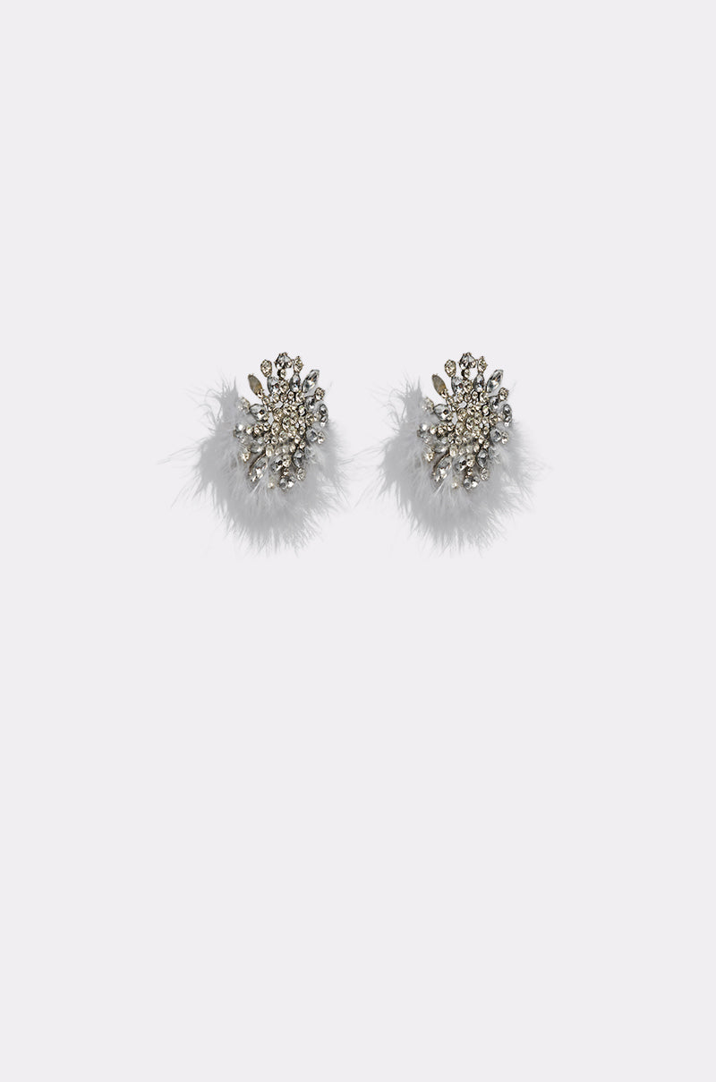 The LIFE OF THE PARTY EARRING showcases clusters of sparkling rhinestones and delicate white feathers, presented against a plain white background. 3