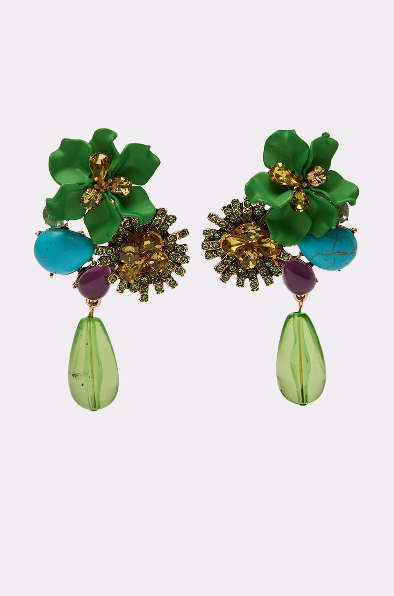 The GREEN GLORY EARRING is a colorful pair featuring green flower shapes, yellow and purple rhinestones, turquoise stones, and dangling green teardrop beads—a striking statement accessory. 0