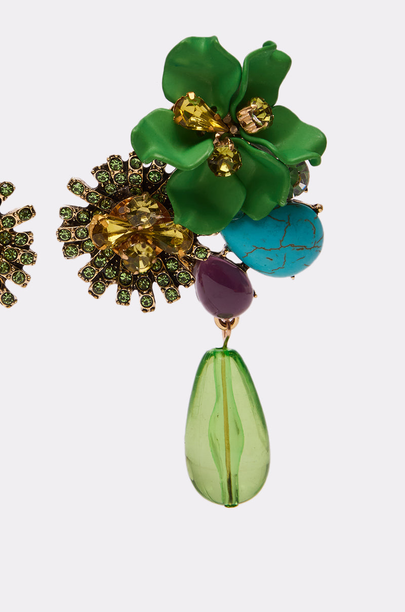 Make a vibrant statement with the GREEN GLORY EARRING, featuring a green flower design with yellow gem petals, turquoise stone, purple bead accents, sparkling yellow and green crystals, and a dangling translucent green teardrop. 3