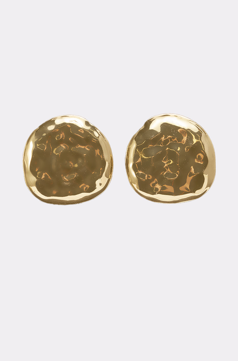 A pair of BENT OUTTA SHAPE EARRINGS featuring a round, gold-toned design with a hammered texture, shown against a plain light background. 2