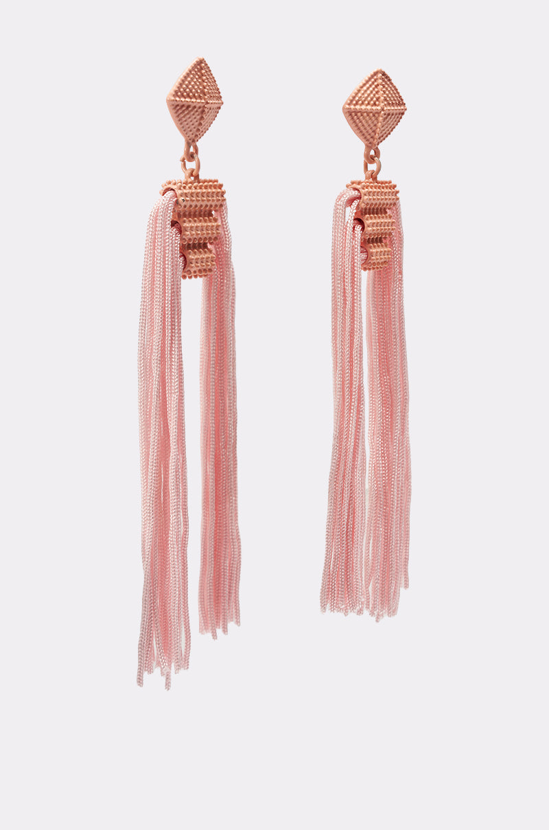 The ASK ME OUT EARRING features rose gold studs with long pink tassel fringe hanging from detailed rectangular connectors, displayed on a light background. 2