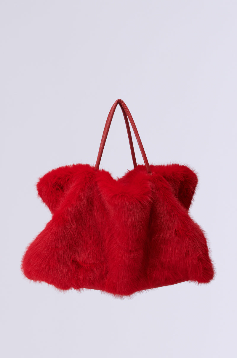 Introducing the LOOK AT ME NOW FAUX FUR TOTE: a textured red shagadelic faux fur handbag with two handles, set against a plain background. 1