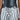 Someone is wearing vertically striped black and white pants with a BUCKLE UP PU BELT, a wide Western-inspired black belt featuring two silver buckles cinching at the waist. Their top is partially visible and white against a plain background.