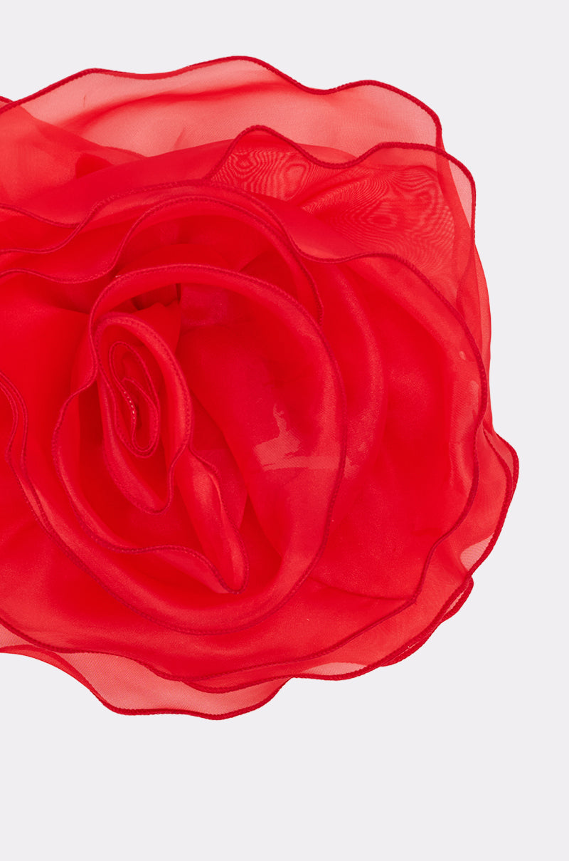 A close-up of the REDDY FOR YOU BROOCH SET shows a vivid red, sheer organza flower with layered petals, resembling a rose—ideal as an oversized brooch or part of a chic floral set against a plain light background. 5