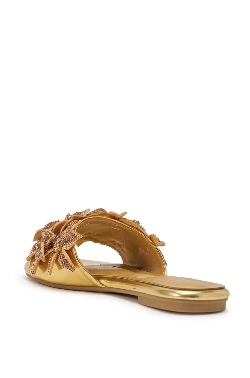 The AZALEA WANG YUNA Gold Flat Slip-On Sandal features a gold faux leather back view and sparkling rhinestone floral embellishments on the upper strap for a chic, radiant look. 6