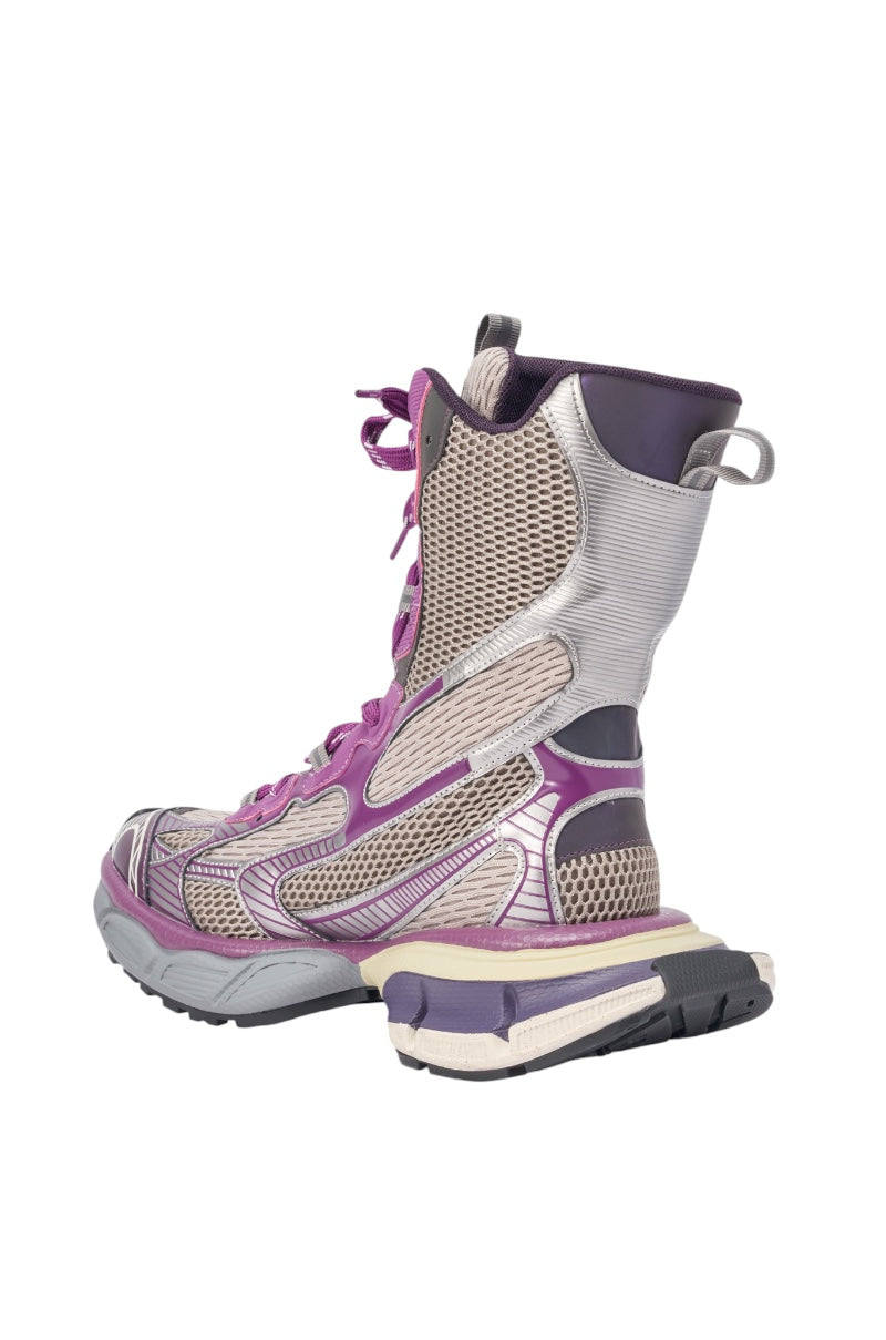 The AZALEA WANG YVONNE PURPLE LACE UP SNEAKER is a high-top in gray and purple, featuring mesh panels, purple accents, a chunky platform sole, and a heel loop, shown at an angle to highlight the back and side. 5