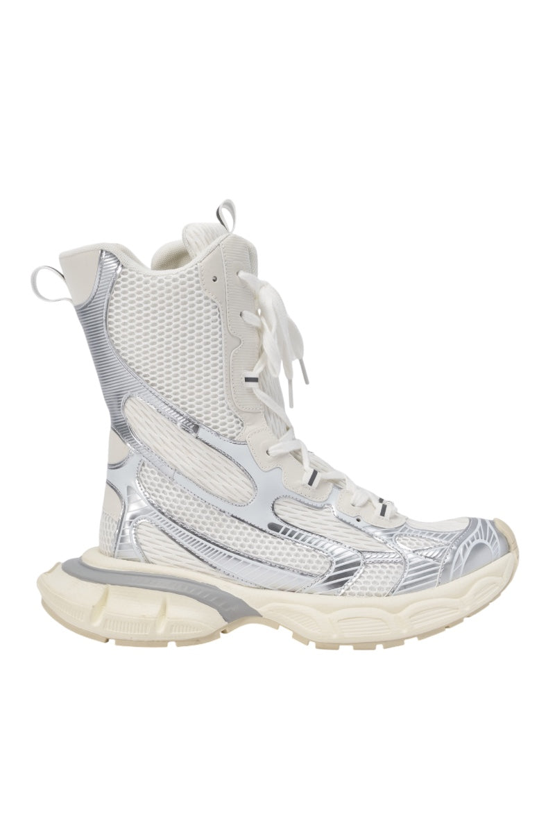 The AZALEA WANG YVONNE WHITE LACE UP SNEAKER is a metallic high-top with a chunky cream sole, white mesh upper, shiny silver accents, white laces, and a heel pull tab for a sporty look. 3