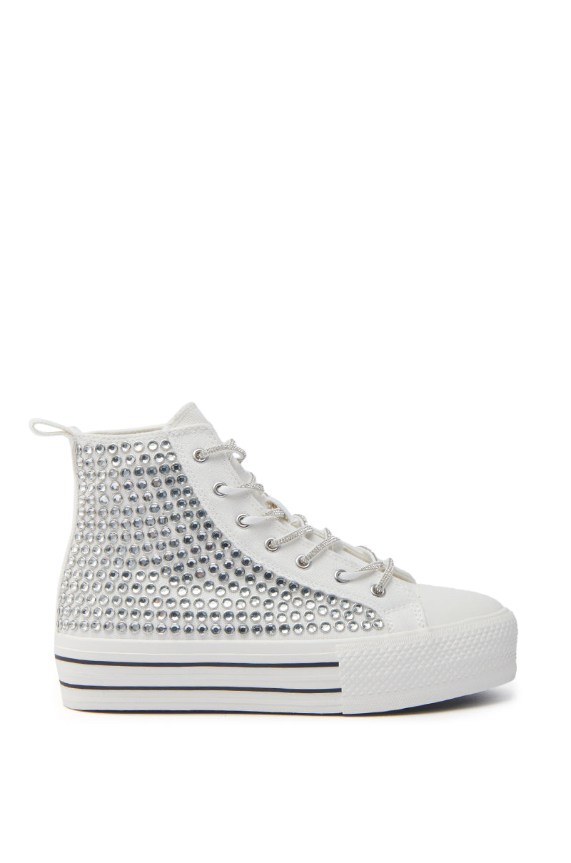 The AZALEA WANG ZAFRINA WHITE HIGH TOP SNEAKER features rhinestone details, silver studs on the sides, silver laces, a platform sole, and two black stripes wrapping the midsole for a bold look.