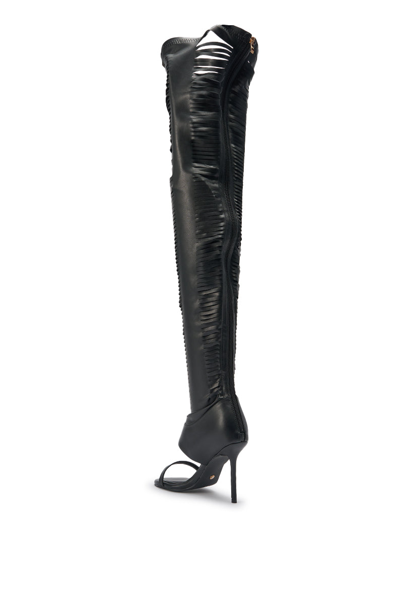 The AZALEA WANG ZARIE Black Thigh High Stretch PU Stiletto Boot features an open toe, gold embellishments, and ruched textured detailing on the shaft, shown against a white background. 5