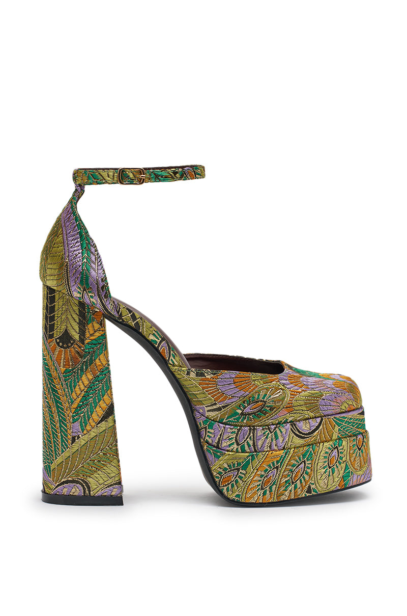 The AZALEA WANG ZIPPHORA GREEN MULTI BROCADE PLATFORM PUMP is a high-heeled, green shoe with a chunky block heel, adjustable ankle strap, and a vibrant embroidered pattern in green, gold, purple, and orange. 8