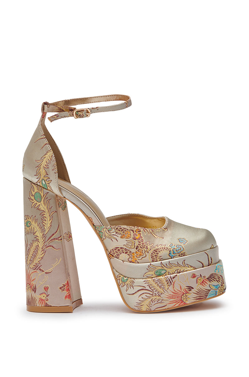 The AZALEA WANG ZIPPORAH New Brocade Mary Jane Platform Pump features a high heel, ankle strap, cream satin finish, and an intricate pastel pink, blue, and gold floral and bird pattern. 3