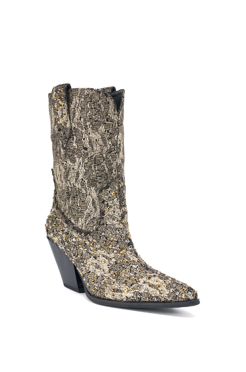 The AZALEA WANG ZIRENNE Gold and Black Brocade Rhinestone Embellished Western Boot features a pointed toe, chunky angled heel, side pull tab, textured multicolored fabric in gray and gold, plus intricate detailing throughout.