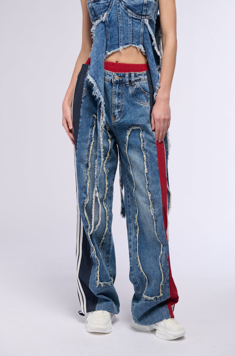 ALL AROUND THE WORLD PATCHWORK DENIM JOGGER PANT IN RED MULTI view 0