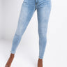 Front View All Over Lace Up Back Skinny Jeans in Light Blue Denim