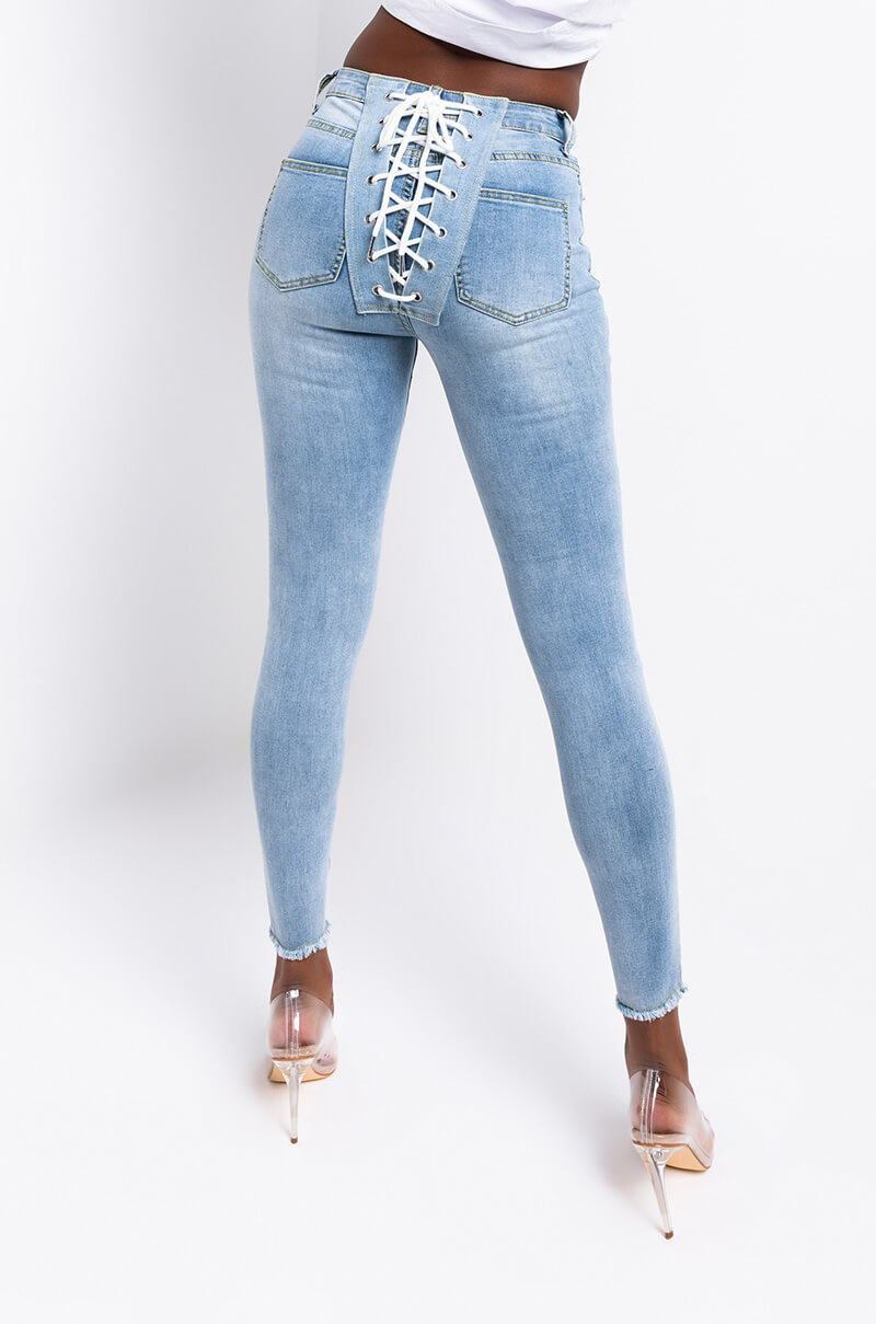 Back View All Over Lace Up Back Skinny Jeans in Light Blue Denim