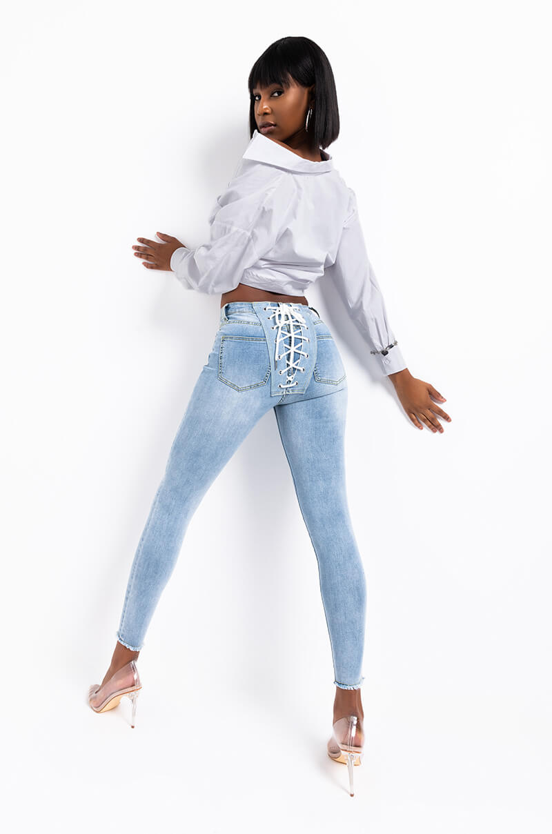  All Over Lace Up Back Skinny Jeans in Light Blue Denim