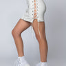 Side View Ammo X Akira Lets Stay Together Pleather Lace Up Mini Skirt in White