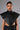 Front View Aria Faux Leather Mock Neck Triangle Blouse