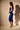 Back View Ariana Ruched Sleeveless Funnel Neck Midi Dress In Blue