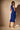 Detail View Ariana Ruched Sleeveless Funnel Neck Midi Dress In Blue