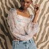 Front View Aster Floral Ruched Crop Blouse in White Multi