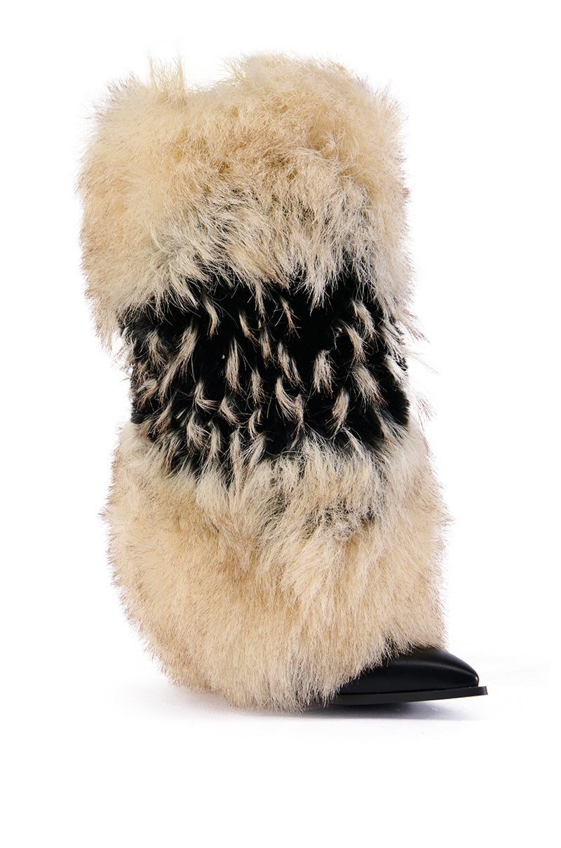 The AZALEA WANG EKKO MULTI FUR STILETTO BOOT is a high-heeled boot uniquely designed with thick, fluffy beige and black faux fur. The black stiletto heel and sole contrast stylishly with the textured fur, set against a white background.