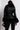 Back View Azalea Wang Faux Fur Trim Peplum Moto in Black