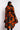 Detail View Azalea Wang Midtown Peplum Puffer Trench in Orange Camo