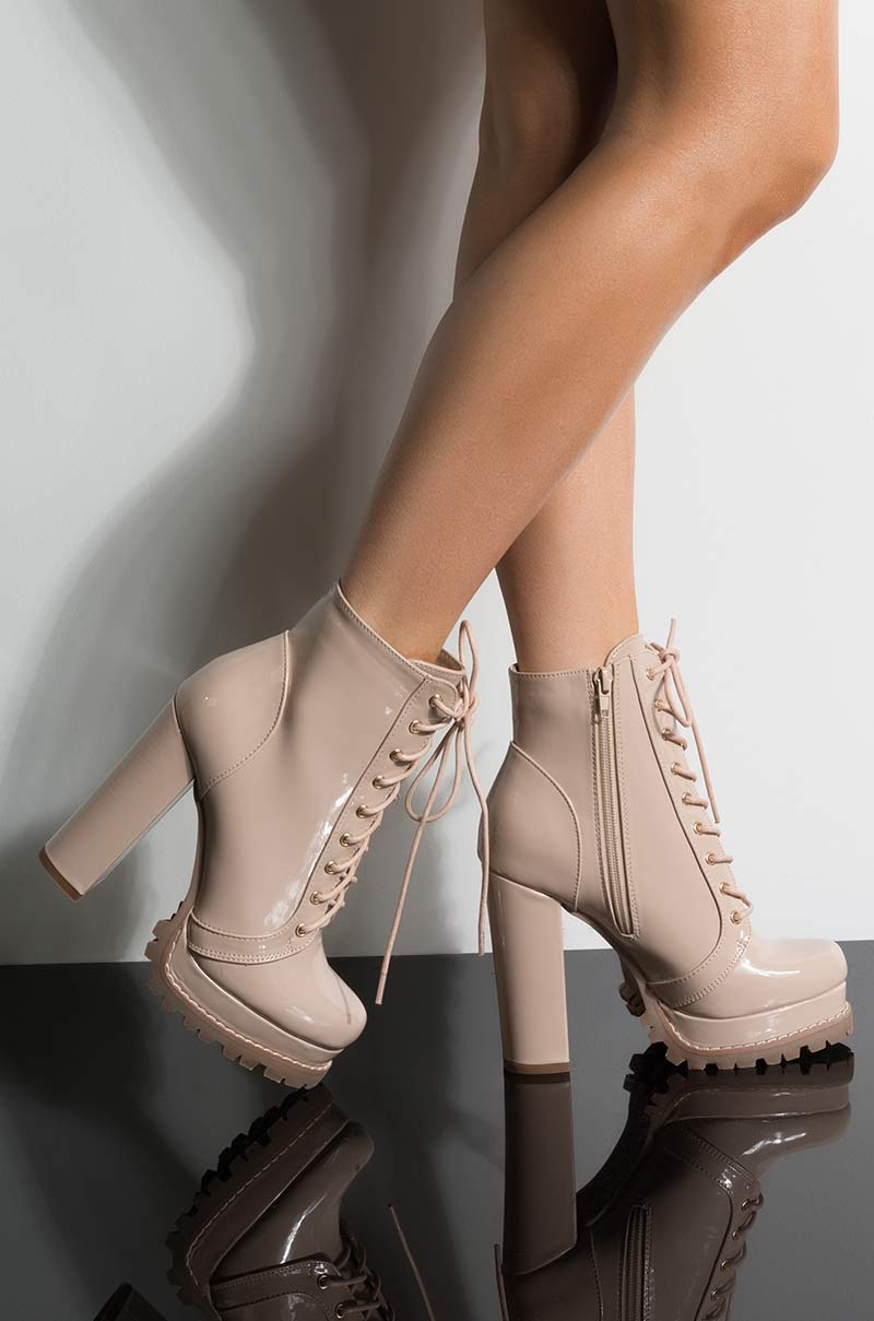 Front View Badass Platform Lace Up Bootie in Nude Patent